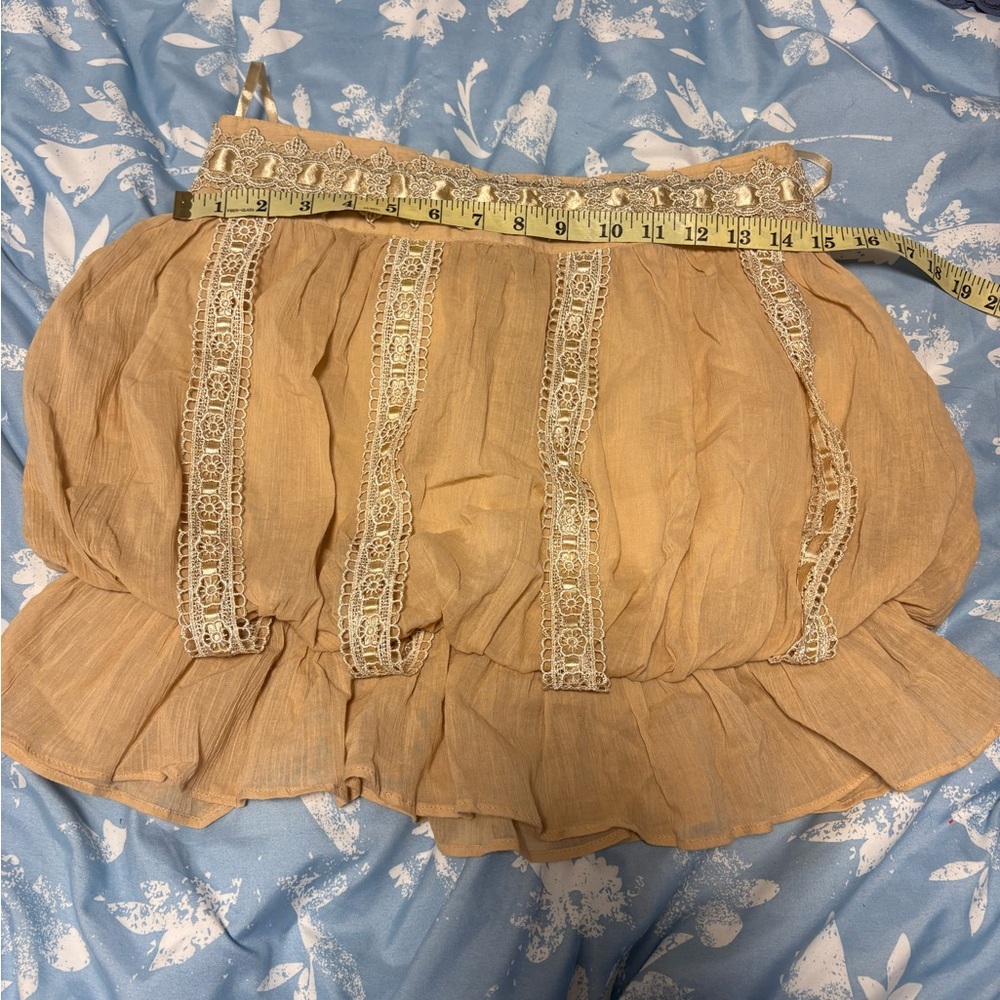 Elegant Cream Mini Skirt with Lace Detailing - Picture 6 of 11